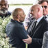Fifa president Gianni Infantino greets the son of Brazilian football legend Pele, Edinho,