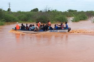 A boat crossing a flooded area from Madogo to Garissa town