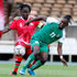 Harambee Starlets defender Dorcas Shikobe (left) vies with Zambia forward Barbra Banda