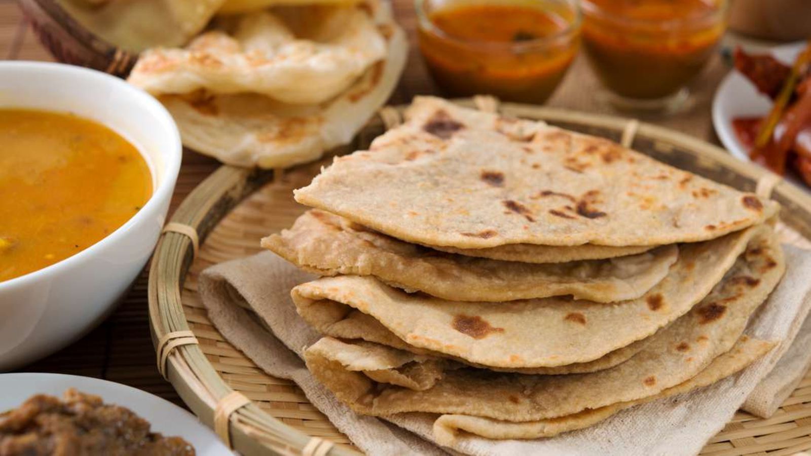 Closeup Image Of Inflated Roti Chapatti Cooking On Kitchen Stove Gas Burner  Wholewheat Atta Flour Elevated View Focus On Foreground Stock Photo -  Download Image Now - iStock