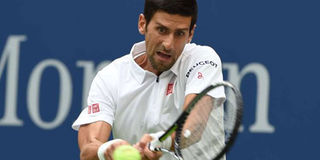 Djokovic battles past Murray