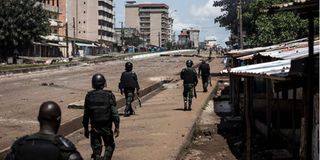 Guinea police patrol in Conakry