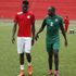 Harambee Stars forwards Michael Olunga (left) and Dennis Oliech