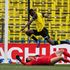 Kashiwa Reysol forward Michael Olunga jumps as he scores