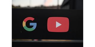 The Google and YouTube logos. Google-owned YouTube has temporarily suspended American President Donald Trump's channel.