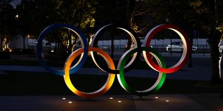 Olympic Rings are seen near the National Stadium, the main venue for the Tokyo 2020 Olympic and Paralympic Games