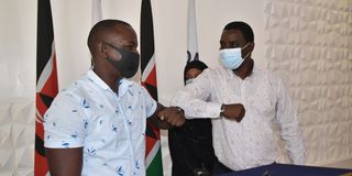 KMPDU's coast secretary, Dr Abidan Mwachi (left), and Mombasa County Chief of Staff Joab Tumbo.