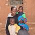 Hellen Naasu, John Gakuya’s widow, with her children at their home in Maralal.
