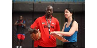 Australian coach Liz Mills (right) consults Morans assistant coach Sadat Gaya