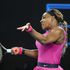 Serena Williams of the US hits a return against Danielle Collins of the US