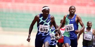 Ferguson Rotich (left) competes with Wycliffe Kinyamal in the 800m race