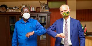 Raila with EU ambassador Simon Mordu