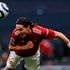 Manchester United striker Edinson Cavani heads the ball and scores 