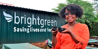 Brightgreen Renewable Chebet Lesan holds up some of the Briquettes made at her workshop located in Karen on April 24, 2021. 