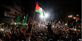 Palestinians celebrate ceasefire