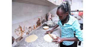 World half marathon record holder Peres Jepchirchir prepares a meal at her home