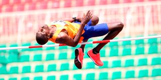 Mathew Sawe in action during high jump competition