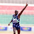 Michael Kibet of Kenya Police celebrates winning the men's 5,000 metres race