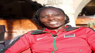 Former world marathon record holder Catherine Ndereba enjoys a light moment during her interview with Nation Sport 