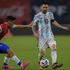 Chile's Pablo Galdames (left) and Argentina's Lionel Messi vie for the ball during their World Cup qualifier