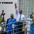 Sierra Leone President Julius Maada Bio gestures to jubilant fans