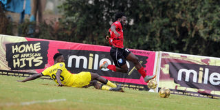 Wazito defender Rooney Onyango (left) vies with AFC Leopards midfielder Caleb Olilo