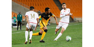 Wydad's Yahya Attiat and Walid El Karti vie with Kaizer Chiefs’ Nkosingiphile Ngcobo