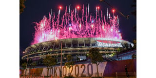 Fireworks light up the sky over the Olympic Stadium during the opening ceremony of the Tokyo 2020 Olympic