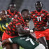 Kenya's Nelson Oyoo (left) is tackled by South Africa's Branco du Preez