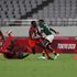 Kenya's Collins Injera heads for the try line 