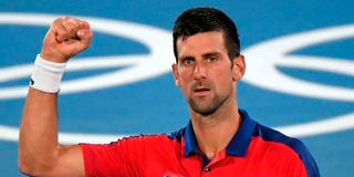 Serbia's Novak Djokovic celebrates defeating Japan's Kei Nishikori during their Tokyo 2020 Olympic Games 