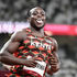 Kenya's Ferdinand Omanyala celebrates his third place in the men's 100m heats during the Tokyo 2020 Olympic Games