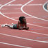 Kenya's Mary Moraa (left) lies flat on the track after finishing third in the women's 800m semi-final Heat 1