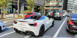 A Ferrari on the streets of Tokyo on August 2, 2021