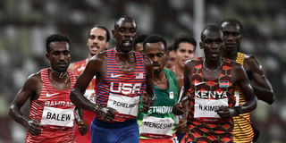 USA's Paul Chelimo (left) competes next to Kenya's Nicholas Kipkorir Kimeli