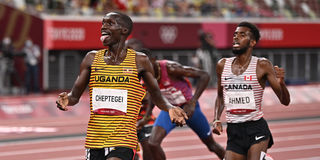Uganda's Joshua Cheptegei celebrates