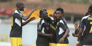 Tusker midfielder Jackson Macharia celebrates