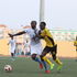 Arta Solar 7's Dany Achille (left) vies for the ball with Tusker forward Boniface Muchiri 