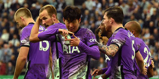 Tottenham Hotspur's South Korean striker Son Heung-Min (centre) celebrates