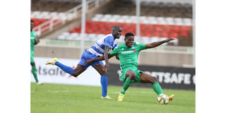 AFC Leopards defender Isaac Kipyegon vies with Gor Mahia forward Benson Omala