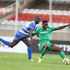 AFC Leopards defender Isaac Kipyegon vies with Gor Mahia forward Benson Omala