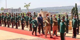Uhuru Kenyatta inspects a guard of honour