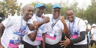 Nation Media Group CEO Stephen Gitagama enjoys a light moment with other participants