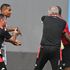 Tunisia's coach Mondher Kebaier (right) protests against Zambia referee Janny Sikazwe 