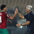Morocco's forward Zakaria Aboukhlal (left) celebrates with head coach Vahid Halilhodzic
