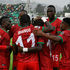 Malawi's forward Gabadinho Mhango celebrates with teammates