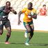 Kenya's Jeff Oluoch (left) chases down an Australian opponent 