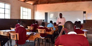 Form One students in class.