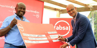 ABSA MD Jeremy Awori and Kenya Open Golf Limited tournament director Patrick Obath