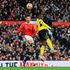 Manchester United striker Cristiano Ronaldo jumps up to head the ball with Watford defender Hassane Kamara